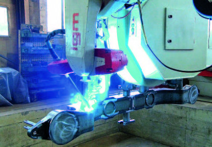 Welding a complete rail car bogie in a single clamping  -  Robot cuts welding time by 40%